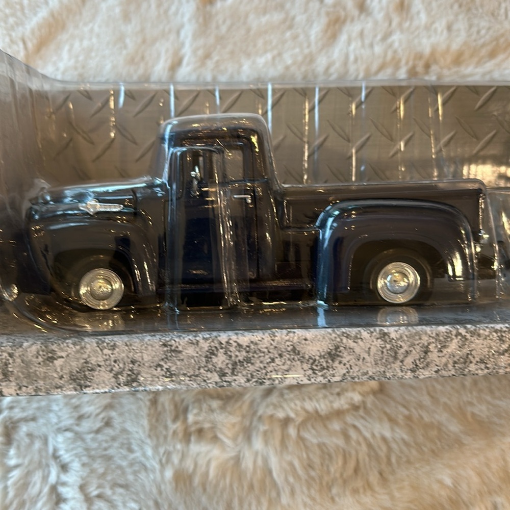 New in box. Motor max truck and trailer with car.